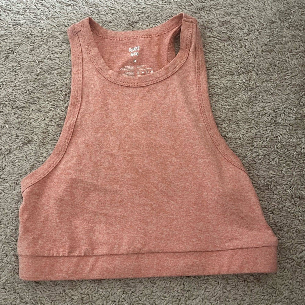 Super cute cropped peach tank top. Size Small.